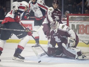 Windsor's Will Cuylle misses on a scoring opportunity in front of Peterborough goaltender, Tye Austin, in OHL action between the Windsor Spitfires and the Peterborough Petes at the WFCU Centre, Saturday, September 21, 2019.