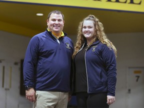 WINDSOR, ON. SEPTEMBER 3, 2019. -- Adam Wagner, head coach of the University of Windsor golf team and new team member Alyssa Getty are shown on Tuesday, September 3, 2019, at the St. Denis Centre in Windsor, ON.