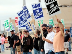 General Motors assembly workers picket outside the General Motors Flint Assembly plant during the United Auto Workers (UAW) national strike in Flint, Michigan, U.S., September 16, 2019.