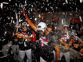 The St. Louis Cardinals celebrate in the locker room after their 13-1 win over the Atlanta Braves in game five of the National League Division Series at SunTrust Park on Oct. 9, 2019, in Atlanta, Georgia.