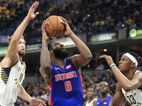 Andre Drummond of the Detroit Pistons shoots the ball in the game against the Indiana Pacers at Bankers Life Fieldhouse on October 23, 2019 in Indianapolis, Indiana.