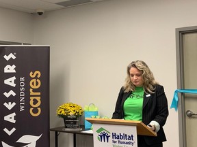 Habitat for Humanity Windsor-Essex executive director Fiona Coughlin speaks at the ribbon-cutting for the  organization's new Caesars Windsor Cares Skills Lab located at the Habitat ReStore. The lab will provide a space for skills-based learning and training in partnership with community groups.