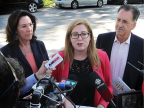 Federal NDP candidates Cheryl Hardcastle (Windsor-Tecumseh), left, Tracey Ramsey (Essex) and Brian Masse (Windsor West) speak to reporters about the party's platform on Crawford Avenue in Windsor on Thursday, Oct. 10, 2019.