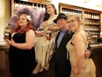 Thirsty business, bootlegging was. Larry Horwitz stands with members of the Win City Roses burlesque group, from left, Dolly Diamond Dogfight, Charlotte Chartreuse and Develin Von Treat in front of the bar at the Water's Edge Event Centre during the Bootleggers Bash on Friday, Oct. 11, 2019.