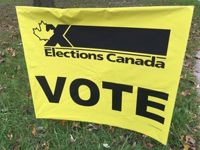 Square Elections Canada vote sign, outside a Canadian voting station at the Optimist Community Centre on Ypres Boulevard, Oct. 21, 2019.