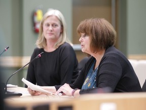 Celeste O'Neil (left) and Judy Wellwood-Robson (right) speak before Tecumseh town council in opposition to a cannabis production facility in Oldcastle on Tuesday, October 22, 2019.