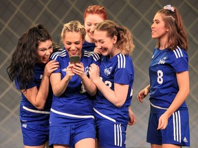 The University Players present The Wolves, fearless female fighters on the soccer pitch at Essex Hall Theatre opens November 1, 2019.  In photo, actors Celeste Maria Fiallos, left, Flora Janos, Michelle Blight, Michelle Young and Kiera Publicover, right, gather to view their quirky team photo.