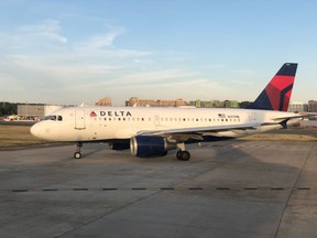 A Delta Airlines passenger jet is seen at Ronald Reagan National Airport (DCA) in Arlington, Virginia, on September 25, 2019.