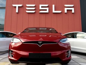 The logo marks the showroom and service centre for the US automotive and energy company Tesla in Amsterdam on Oct. 23, 2019.