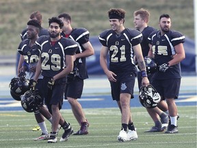 In this Aug. 14, 2019, photo, members of the Windsor AKO Fratmen are shown during a practice at the University of Windsor Alumni Field.