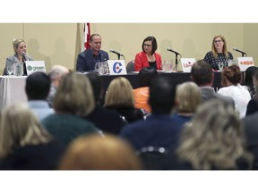 Essex candidates from left, Jennifer Alderson (Green), Chris Lewis (Conservative), Audrey Festeryga (Liberal) and Tracey Ramsey (NDP) are shown during the Windsor-Essex Regional Chamber of Commerce federal election debate at the Hellenic Cultural Centre in Windsor on Tuesday, October 1, 2019.