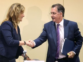 Windsor West Liberal candidate Sandra Pupatello and incumbent NDP MP Brian Masse shakes hands after participating in the Windsor-Essex Regional Chamber of Commerce federal election debate at the Hellenic Cultural Centre in Windsor on Tuesday, October 1, 2019.