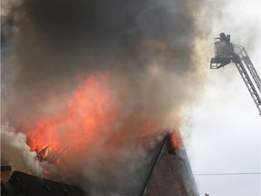 Windsor firefighters battle a fire at the Walkerville Evangelical Baptist Church in the 800 block of Windermere Road on Sunday, Oct. 27, 2019.