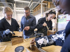 All-girls. Teacher Ryan Coop is shown with Peri Colthurst, left, Tessa Westfall and Caitlin Saintfort, Grade 9 students at St. Joseph's Catholic High School in Windsor, during the Exploring Technologies course on Wednesday, Oct. 9, 2019. The course, set up exclusively for girls, teaches an assortment of skilled trades techniques.