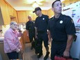 Firefighters with the Windsor Fire and Rescue Services partnered with the Victorian Order of Nurses Meals on Wheels program on Wednesday, October 2, 2019, for a safety blitz of the program's local clients. The goal was to help ensure that residents with limited mobility have working smoke alarms, carbon monoxide alarms, and a developed and practiced home escape plan. Mary Keltika has her east Windsor residence checked out by firefighters Darren Dixon, left, Bryan Beneteau and P.D. Pinsonneault during the event.