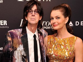 Singer/musician Ric Ocasek and model Paulina Poriskova attend The Hollywood Reporters 35 Most Powerful People In Media at Four Seasons Grill Room on April 10, 2013 in New York City. (Stephen Lovekin/Getty Images)