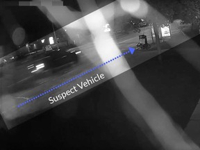 A surveillance camera image of a black Ford pickup truck that Windsor police believe struck and critically injured a female cyclist in the Forest Glade area on the night of Sept. 6, 2019.