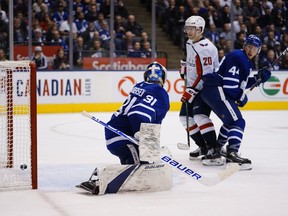 A shot by Washington Capitals forward Alex Ovechkin (not pictured) scores against Toronto Maple Leafs goaltender Frederik Andersen (31) as Washington forward Lars Eller (20) and Toronto defenseman Morgan Rielly (44) look on at Scotiabank Arena.