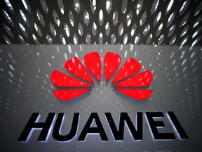 A Huawei company logo is pictured at the Shenzhen International Airport in Shenzhen, Guangdong province, China July 22, 2019.