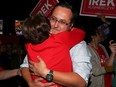 Liberal challenger Irek Kusmierczyk embraces a supporter at his victory party after winning the MP seat for Windsor-Tecumseh on Oct. 21, 2019.