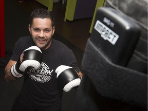 Brandon Kersey, co-owner of Kersey Kickbox Fitness Club, is pictured with the newly unveiled Impact Wrap, Tuesday, Oct. 29, 2019.