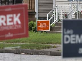 Anybody's to win? Lawn signs for Windsor-Tecumseh candidates from the Liberal, Conservative and NDP parties are shown Oct. 3, 2019, on Marion Avenue. A new poll suggests all three major parties are in play in the local riding. Canadians go to the polls on Oct. 21.