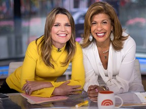 "Today" show co-anchors Savannah Guthrie, left, and Hoda Kotb pose on set at NBC Studios on Wednesday, June 27, 2018, in New York.