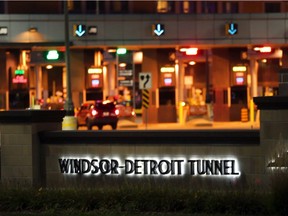 Cars drive through the Windsor-Detroit Tunnel before it closes for repairs.