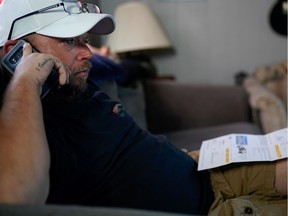 Frank Lee, a striking UAW auto worker from the General Motors assembly plant in Bowling Green, calls a bill collector from his home in Auburn, Kentucky, U.S., October 1, 2019.