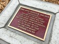 A close-up of a plaque at the memorial area dedicated to Sara Anne Widholm. Photographed Oct. 2, 2019.