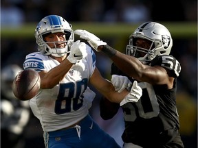 Danny Amendola of the Detroit Lions can not catch a pass thrown to him while he was covered by Nicholas Morrow of the Oakland Raiders at RingCentral Coliseum on November 03, 2019 in Oakland, California.