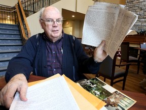 Lloyd Brown-John displays a typewritten account from Johanna Efron detailing her arrest by the Gestapo in Berlin in 1943, and her subsequent time in prison.