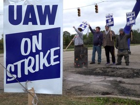 In this still image taken from video, autoworkers strike against General Motors on October 16, 2019, in Lordstown, Ohio.