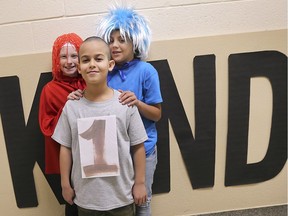 Local schools have been participating in the provincial Bullying Prevention and Awareness Week. Students at Coronation Public School in Windsor performed an adaptation of Kathryn Otoshi's book One which deals with bullying scenarios. Students Abby Munro, 10, left, Suhaib Abuelezz, 9, and Addy Kisil, 10, pose for a photo on Wednesday, November 20, 2019, after a performance of the play.