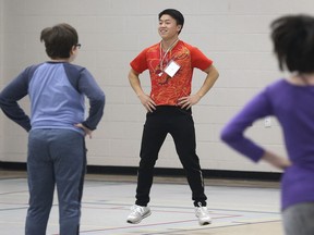 WINDSOR, ON. NOVEMBER 14, 2019. -- Zicai Li, a teacher from China instructs a physical education class at the West Gate Public School in Windsor, ON. on Thursday, November 14, 2019.