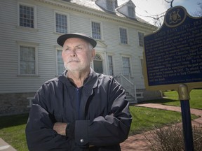 Don Wilson, president of Les Amis Duff Baby, is shown outside the Duff-Baby House in Olde Sandwich on April 22, 2019.