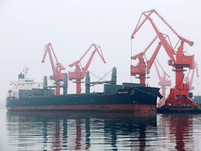 FILE PHOTO: A crude oil tanker is seen at Qingdao Port, Shandong province, China, April 21, 2019.
