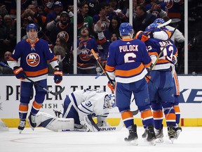 Derick Brassard and the New York Islanders celebrate his third period goal against Frederik Andersen of the Toronto Maple Leafs at NYCB Live's Nassau Coliseum on Wednesday, Nov. 13, 2019, in Uniondale, N.Y.