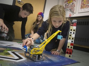 Training the next generation of scientists and engineers. Sebastian de Verteuil, 10, left, Lorelai Johnston, 13, and Simone de Verteuil, 8,  students at Windsor's Victoria Public School, took part Nov. 15, 2019, in a FIRST Lego League practice at the Windsor Jewish Community Centre in preparation for a regional competition next month in Waterloo. Winners will then go the United States to compete against schools from around the world. FIRST means: For Inspiration and Recognition of Science and Technology.
