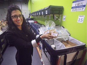 Melissa Pare with the VON Meals on Wheels program packs cookies in the outgoing meals on Friday, November 1, 2019, at the Unemployed Help Centre in Windsor, ON. The WindsorEssex Community Foundation donated 250 cookies to celebrate Random Act of Kindness Day.