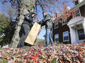 Walkerville Collegiate Institute students and staff were out in force on Friday, November 8, 2019, raking leaves in the neighbourhood near their school. It was part of the Random Acts of Kindness event. Students Aidan Laflamme, left, and Sean Holmes team up to rake leaves on Argyle Road during the event.