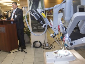 Windsor Regional Hospital president and CEO, David Musyj, speaks in front of a da Vinci Surgical Robot during a press conference at Met Campus, Monday, Nov. 4, 2019.