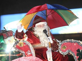 The man of the hour waves to fans during Windsor's Santa Claus Parade in December 2018.