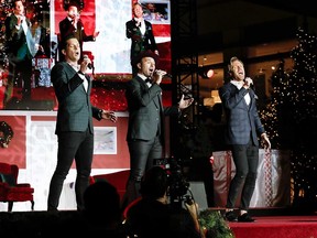The Tenors (left to right: Clifton Murray, Victor Micallef, and Fraser Walters) performing in Los Angeles on Nov. 17, 2019.