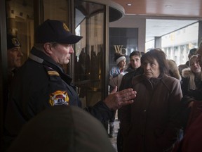 Patience was wearing thin with residents of Westcourt Place as a firefighter with Windsor Fire and Rescue tells them there will be a delay in getting them up to their apartments to retrieve personal items, including some that have pets on Nov. 12, 2019.  It was announced today residents will not be allowed to permanently return for 72 hours or more.