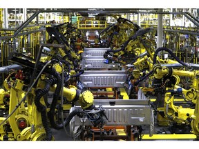 Ford F150 trucks go through robots on the assembly line at the Ford Dearborn Truck Plant on September 27, 2018 in Dearborn, Michigan. The Ford Rouge Plant is celebrating 100 years as America's longest continuously operating auto plant. The factory produced Eagle Boats during WWI and currently produces the Ford F150 pickup truck.