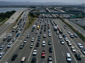 Traffic backs up at the San Francisco-Oakland Bay Bridge toll plaza along Interstate 80 on July 25, 2019 in Oakland, California.
