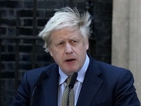 Prime Minister Boris Johnson makes a statement in Downing Street after receiving permission to form the next government during an audience with Queen Elizabeth II at Buckingham Palace earlier today, on December 13, 2019 in London, England. The Conservative Party have realised a decisive win in the UK General Election. With one seat left to declare they have won 364 of the 650 seats available. Prime Minister Boris Johnson called the first UK winter election for nearly a century in an attempt to gain a working majority to break the parliamentary deadlock over Brexit. working majority to break the parliamentary deadlock over Brexit. He said at an early morning press conference that he would repay the trust of voters.