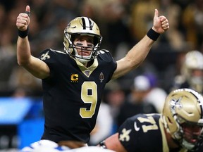 Quarterback Drew Brees of the New Orleans Saints calls a play on the line of scrimmage during the game against the Indianapolis Colts at Mercedes Benz Superdome on December 16, 2019 in New Orleans, Louisiana.