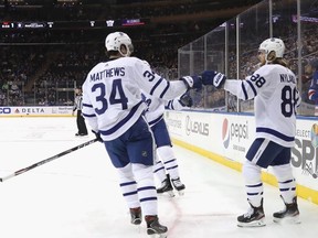 Auston Matthews and William Nylander of the Toronto Maple Leafs celebrate Nylanders first period goal against the New York Rangers at Madison Square Garden on December 20, 2019 in New York City.